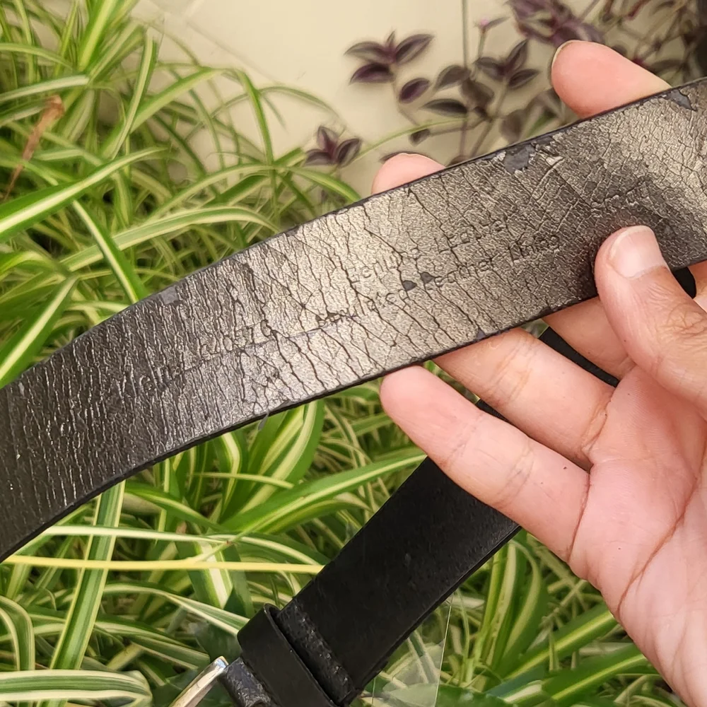 Calvin Klein black leather belt with rhinestone holes